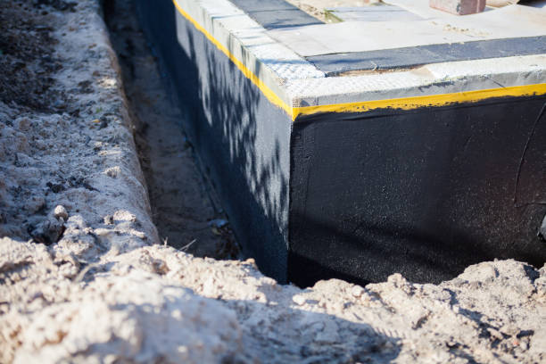 Professional Waterproofing technician working in Haskell, NJ